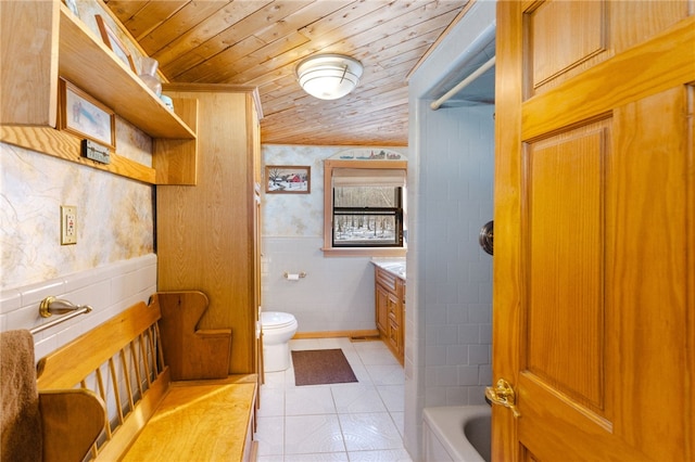 bathroom featuring tile patterned floors, vanity, tile walls, wooden ceiling, and toilet