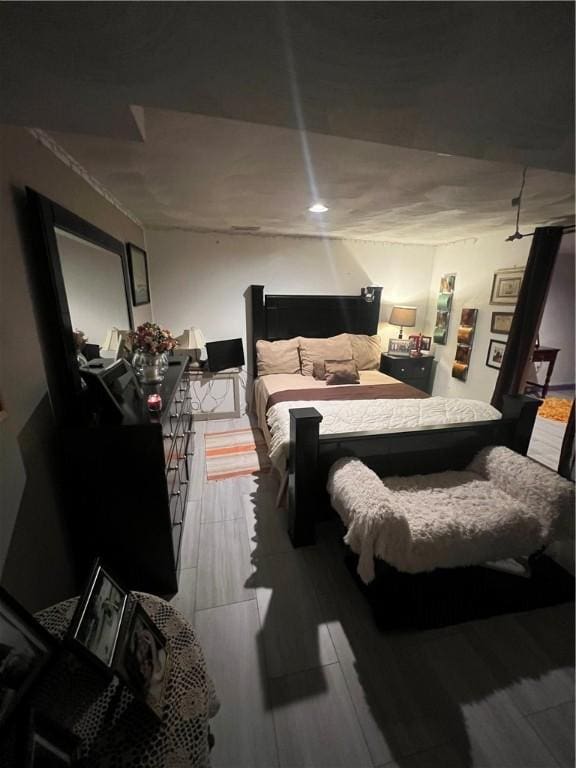 bedroom featuring light wood-type flooring