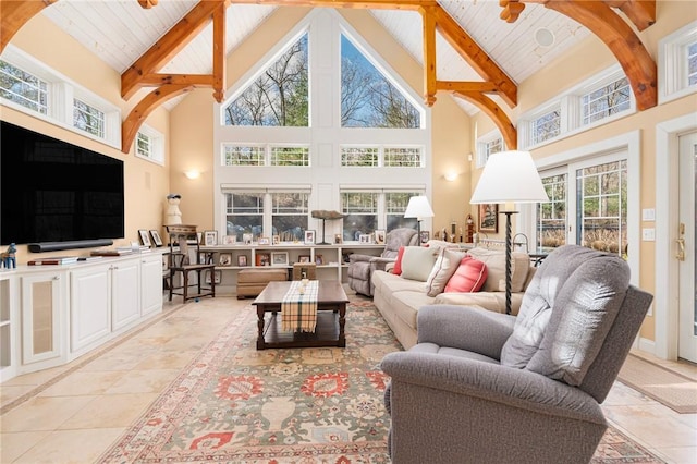 interior space with light tile patterned floors, wood ceiling, high vaulted ceiling, and beamed ceiling