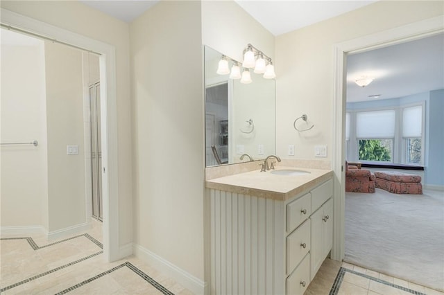 bathroom featuring vanity and walk in shower