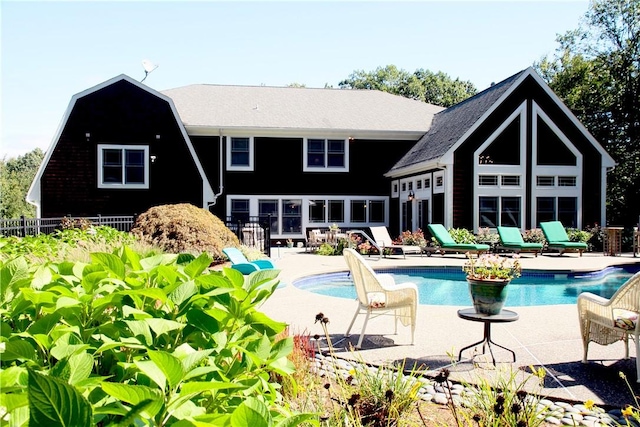 rear view of property with a patio