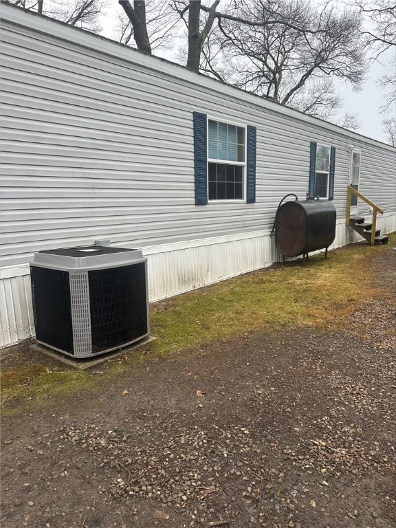 view of property exterior featuring cooling unit