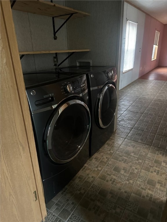 laundry room with washer and clothes dryer