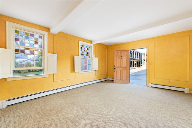 carpeted empty room featuring beamed ceiling and baseboard heating