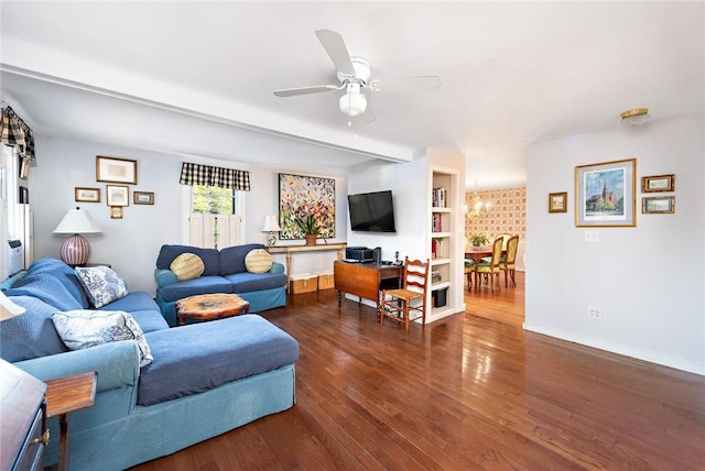 living room featuring ceiling fan, beam ceiling, and dark hardwood / wood-style flooring