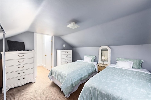 carpeted bedroom with vaulted ceiling