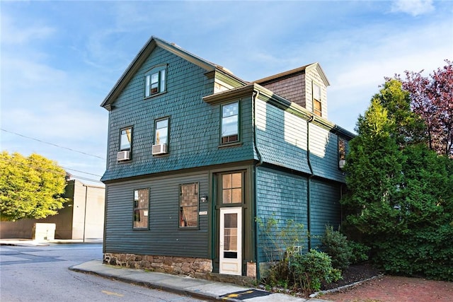 front facade featuring cooling unit