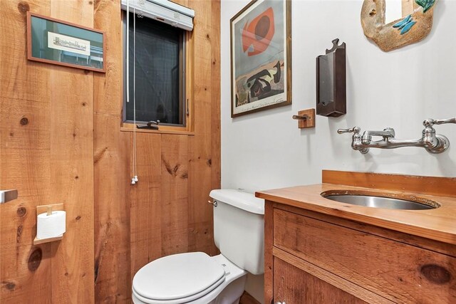 1635 Isabella Beach Rd, Southold, NY 06390 - half bath featuring vanity and toilet