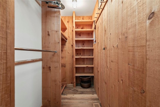 1635 Isabella Beach Rd, Southold, NY 06390 - walk in closet with hardwood / wood-style floors
