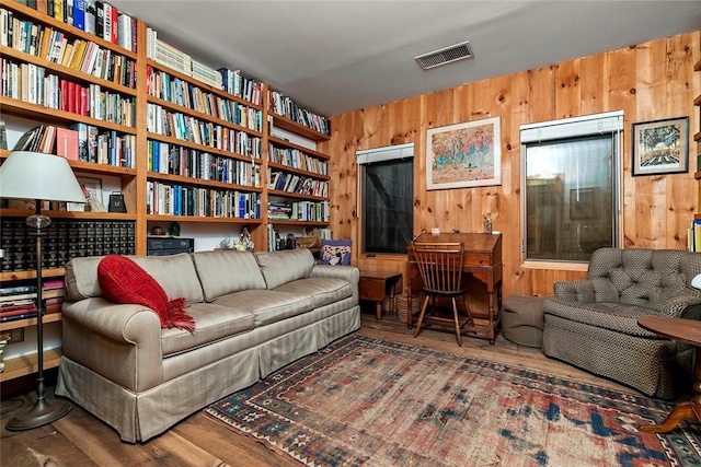 1635 Isabella Beach Rd, Southold, NY 06390 - sitting room with wood finished floors and wooden walls