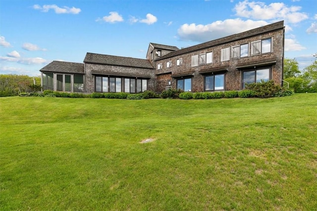 1635 Isabella Beach Rd, Southold, NY 06390 - back of property with brick siding and a lawn