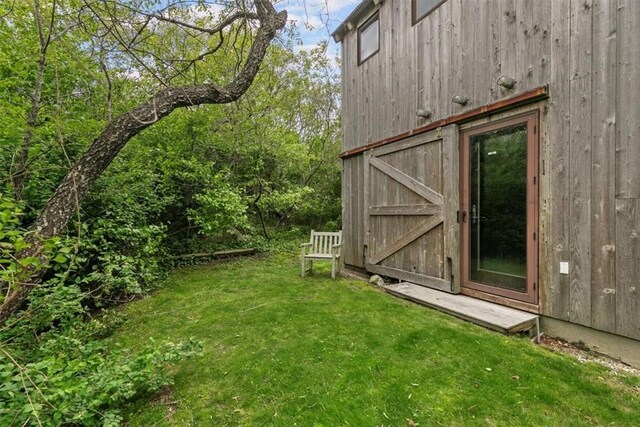 1635 Isabella Beach Rd, Southold, NY 06390 - view of grassy yard featuring an outbuilding