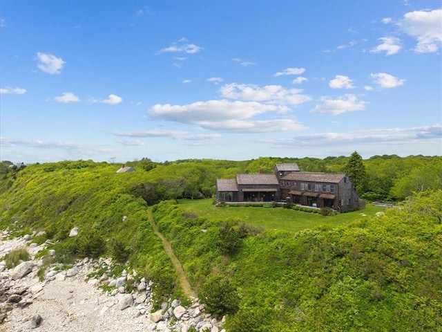 1635 Isabella Beach Rd, Southold, NY 06390 - view from above of property with a heavily wooded area