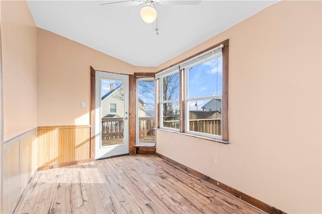 unfurnished room with ceiling fan and light hardwood / wood-style flooring