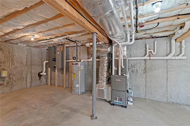 basement featuring heating unit and water heater