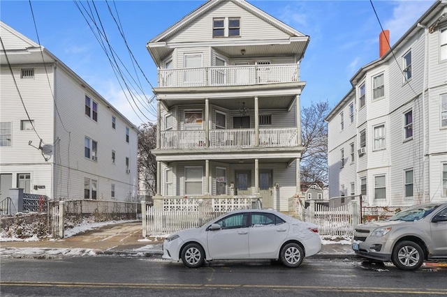 front of property featuring a balcony