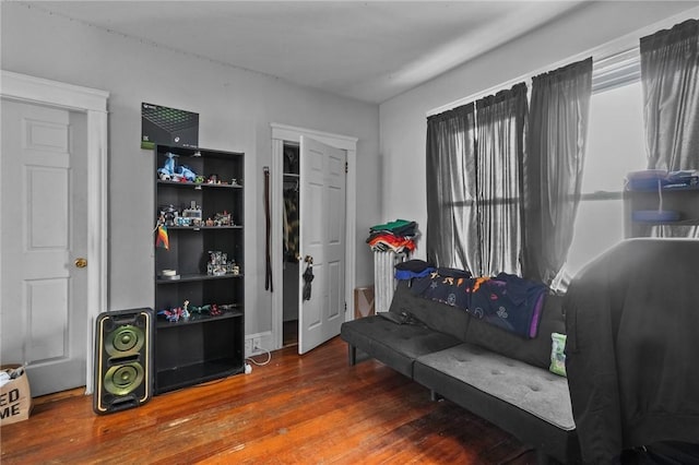 sitting room featuring hardwood / wood-style flooring