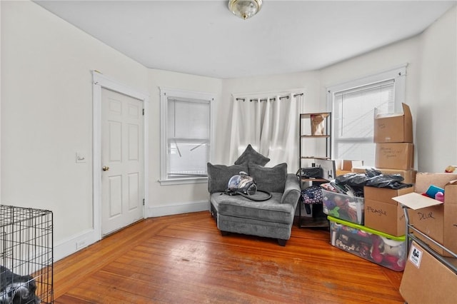 sitting room with hardwood / wood-style floors