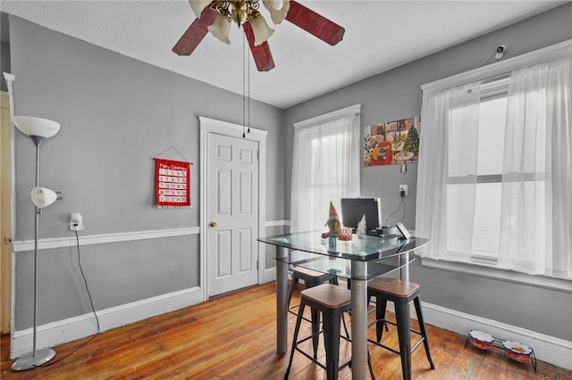 interior space with hardwood / wood-style flooring and ceiling fan