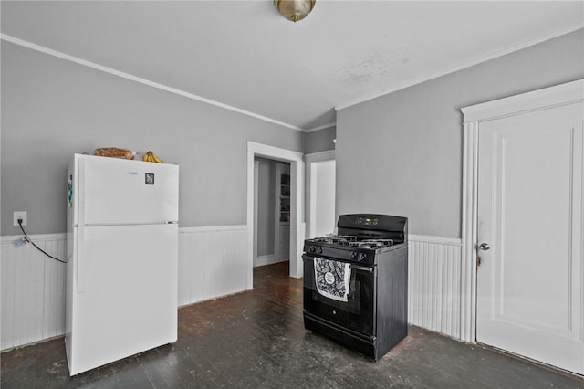 kitchen featuring dark hardwood / wood-style flooring, white refrigerator, gas stove, and crown molding