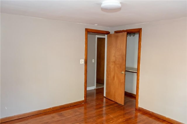 unfurnished room featuring hardwood / wood-style floors