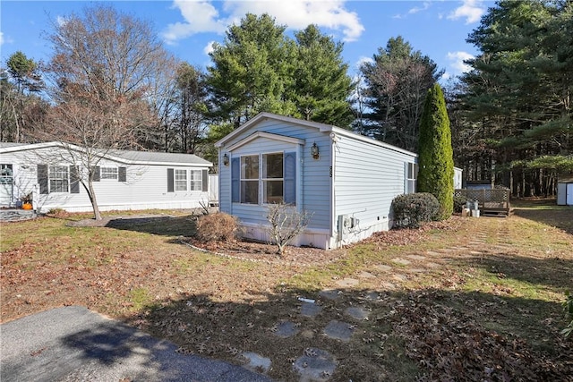 exterior space with a front lawn