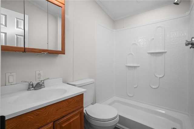 bathroom with vanity, toilet, and walk in shower