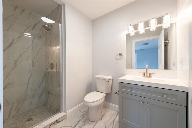 bathroom featuring walk in shower, vanity, and toilet