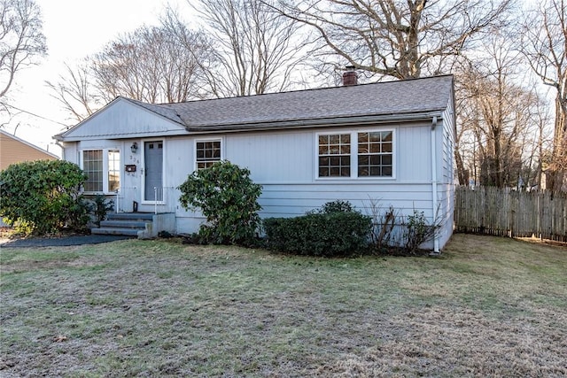 view of front of home with a front lawn