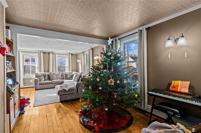 interior space featuring crown molding and hardwood / wood-style flooring