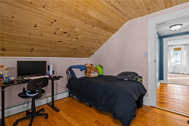 bedroom with wood-type flooring, vaulted ceiling, and wooden ceiling