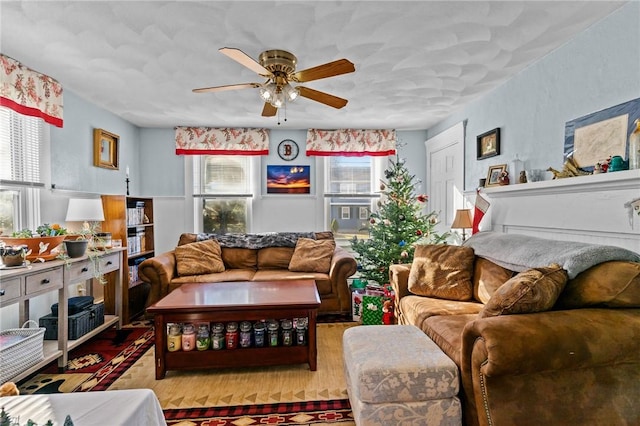 living room featuring ceiling fan