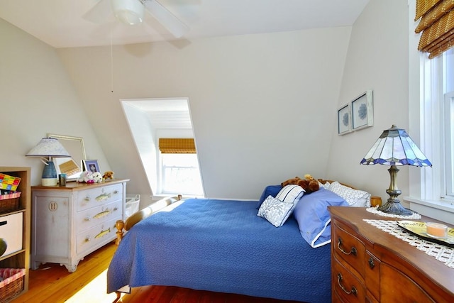 bedroom featuring ceiling fan and light hardwood / wood-style floors