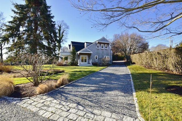 view of front of home with a front lawn