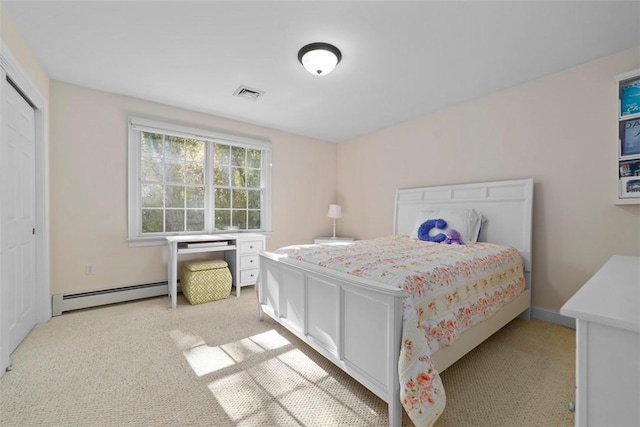 carpeted bedroom with a baseboard radiator and a closet