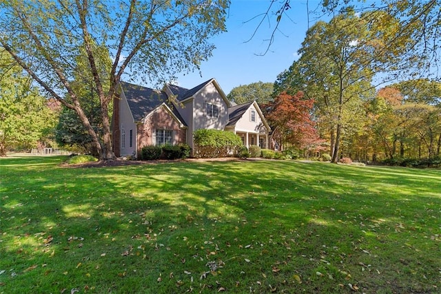 view of front of home with a front lawn