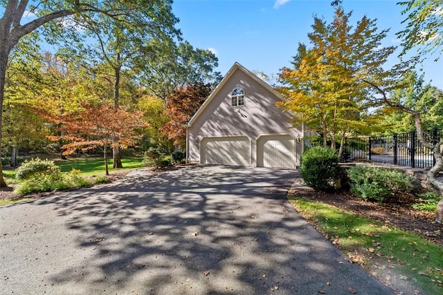 view of home's exterior featuring a garage