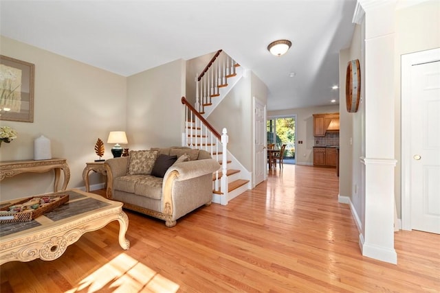 living room with light hardwood / wood-style flooring