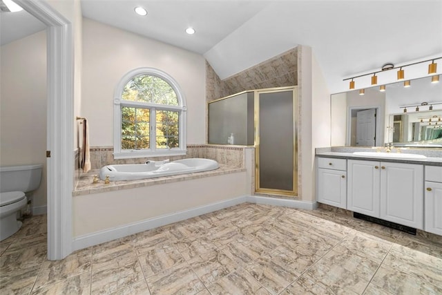 full bathroom featuring vanity, separate shower and tub, toilet, and lofted ceiling