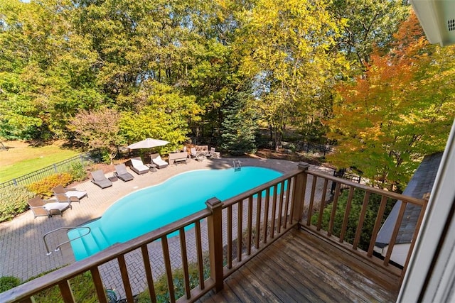 view of swimming pool with a patio