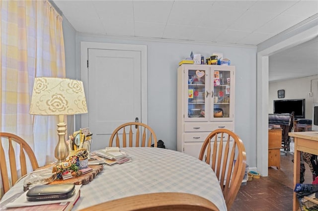 dining area with dark parquet floors