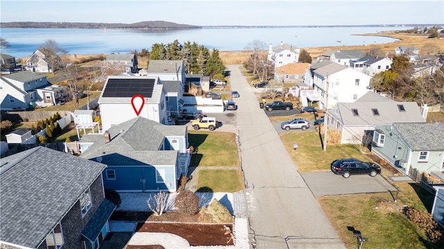 bird's eye view with a water view