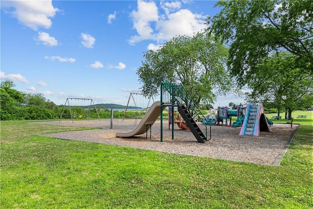 view of playground with a yard