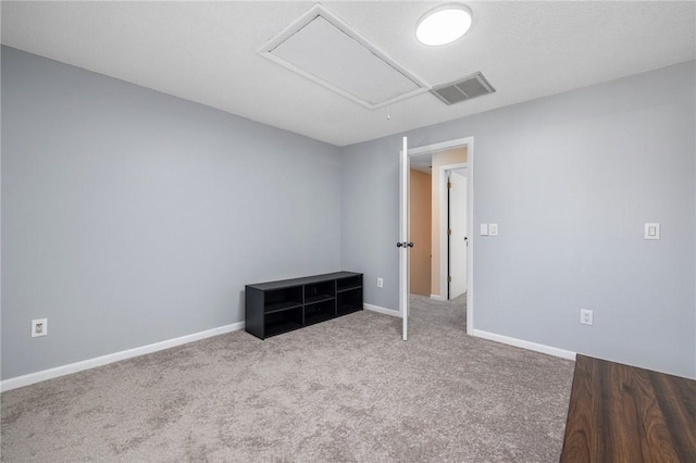 empty room featuring carpet floors