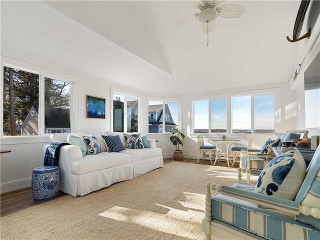 sunroom with vaulted ceiling and ceiling fan