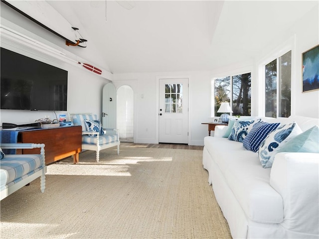 living room with vaulted ceiling