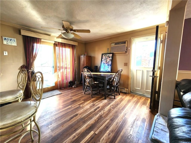 dining space featuring a wall mounted air conditioner, dark hardwood / wood-style flooring, plenty of natural light, and ceiling fan