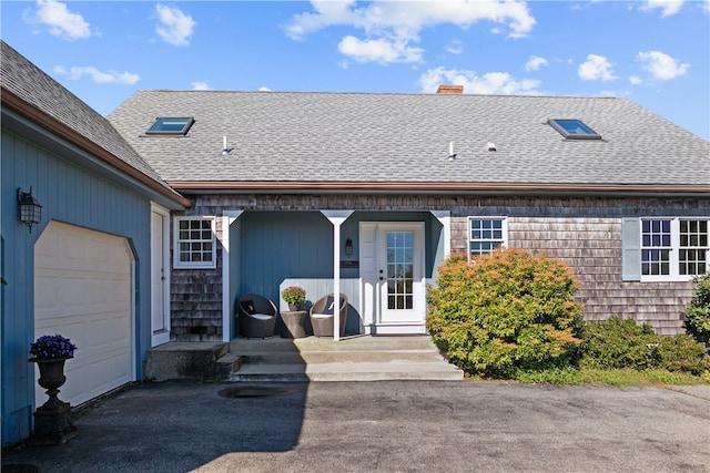 property entrance featuring a garage