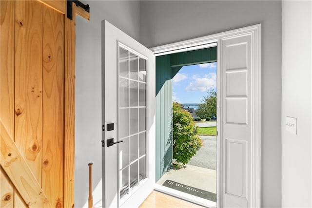 entryway with a barn door