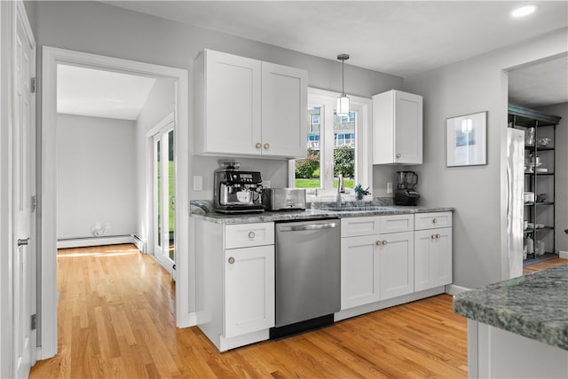 kitchen featuring dishwasher, hanging light fixtures, baseboard heating, white cabinetry, and sink